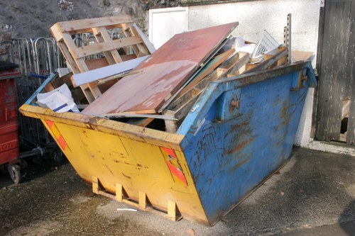 Waste clearance team removing old furniture in East London