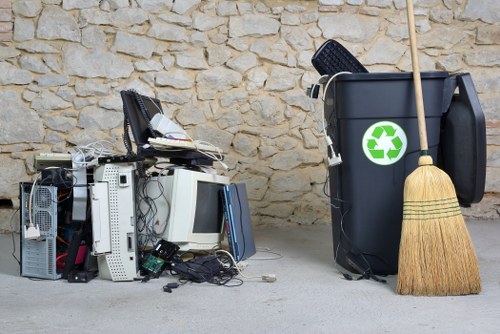 Professional house clearance workers sorting belongings