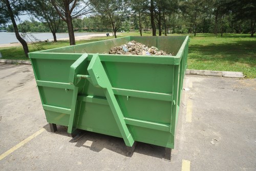 Eco-friendly sofa disposal with recycling symbol